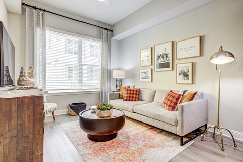 a living room with a couch and a coffee table
